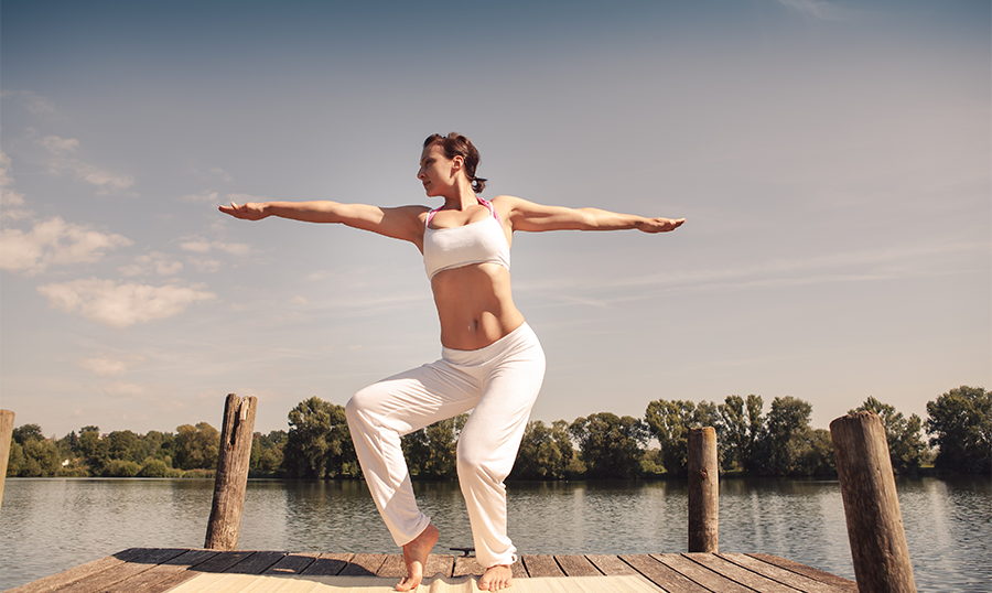 Woman on dock Tai Chi