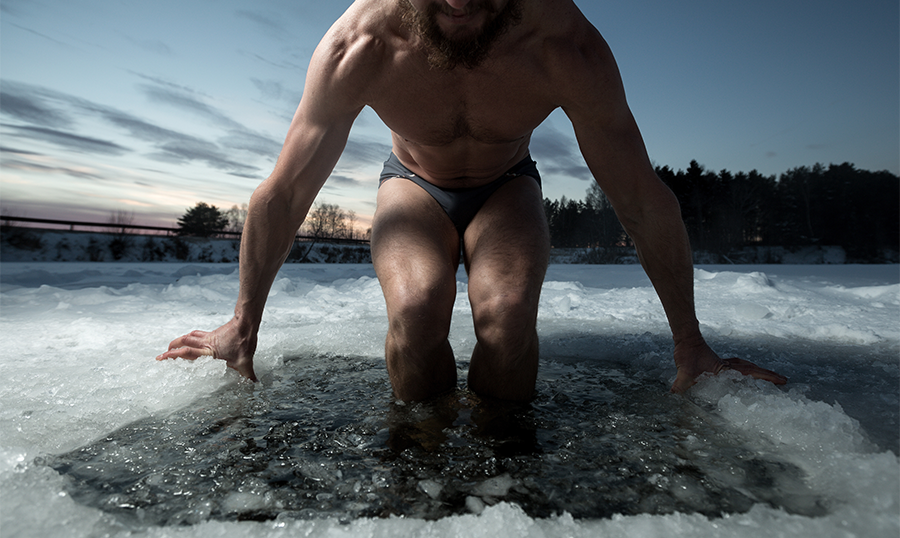 Man about to dip into icy water