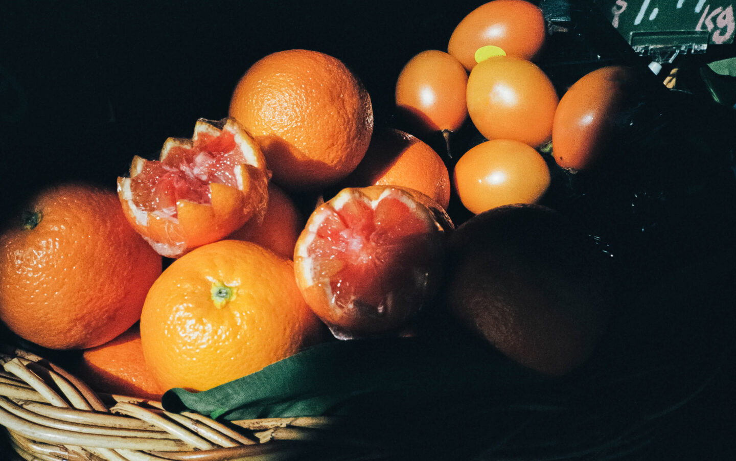 Citrus fruit on display at farmers market, soaked in morning light shot on 35mm film