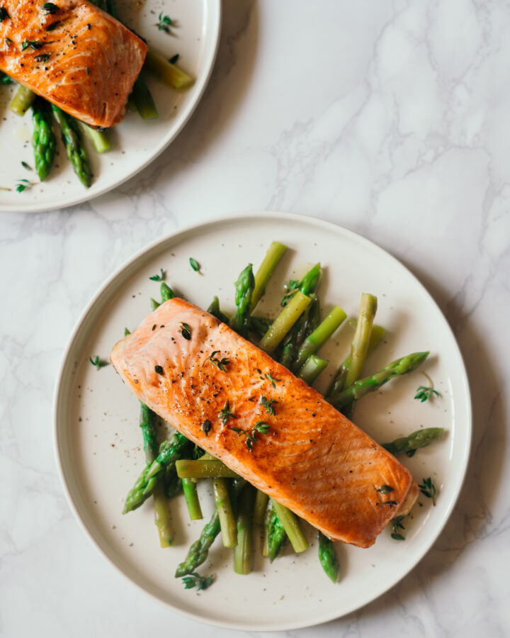 Baked salmon pairs well with asparagus for a complete meal.